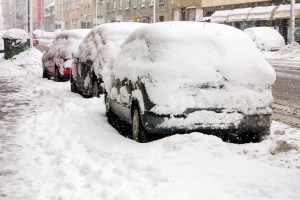 Cars covered with snow